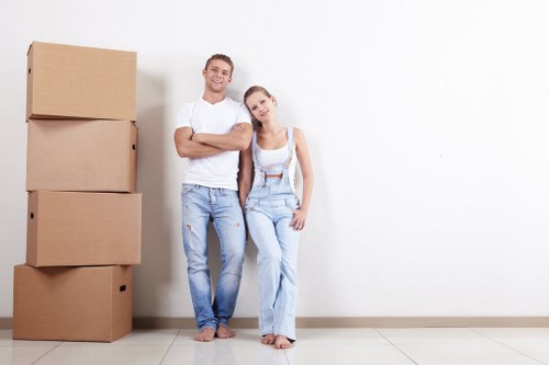 Moving team preparing equipment and assessing safety before a removal job