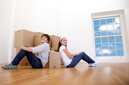 Prepared moving boxes and wrapped furniture for a house move in Tufnell Park