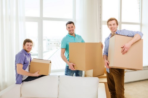 Reliable Tufnell Park moving crew preparing furniture for transport