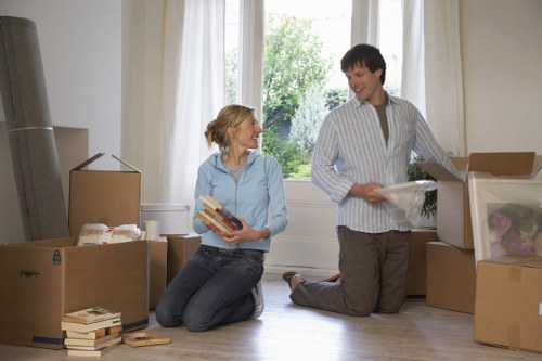 Removal van and movers preparing for a flat relocation in North London