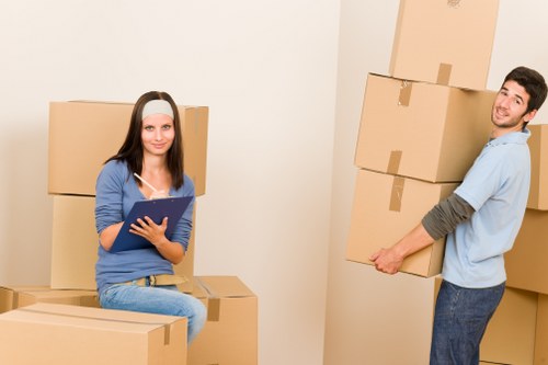 Professional movers loading office items in a Tufnell Park street